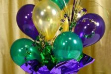 08 a bold purple box with colorful balloons, stars