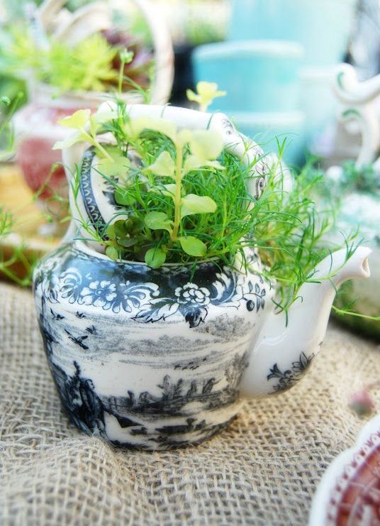 hand painted tea pot with greenery