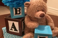 10 alphabet blocks and teddy bear themed centerpiece