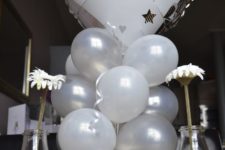 13 white balloons installation for an engagement party