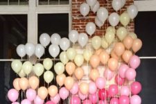 14 a fun ombre balloon backdrop is ideal for any party