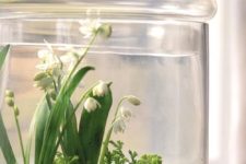 15 a jar with lily of the valley is very spring-like