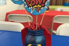 16 a super hero themed centerpiece with comics details