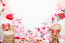 17 oversized blush and red balloon heart as a backdrop