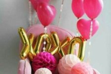 18 pink heart-shaped balloons and XOXO letters for party decor