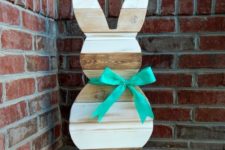 19 reclaimed wood Easter bunny with a turquoise bow