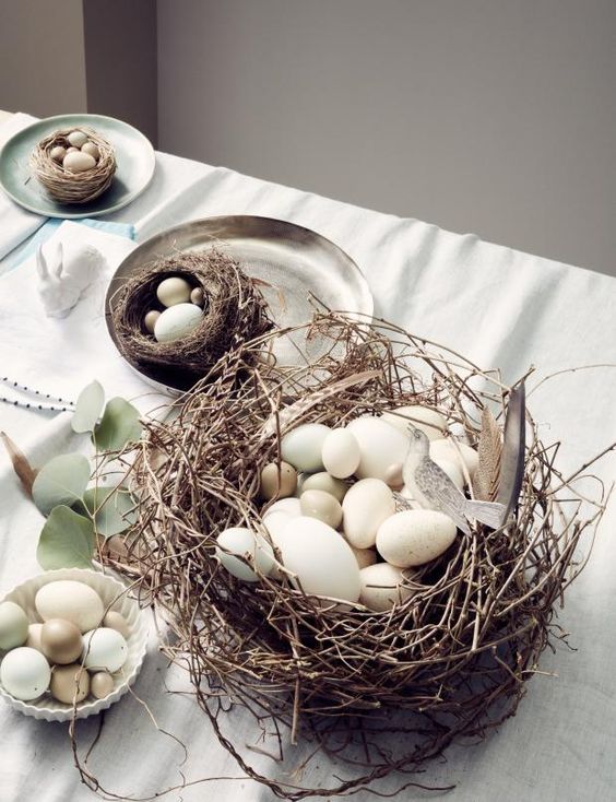 a rustic Easter nest with neutral eggs is a cool decoration or centerpiece