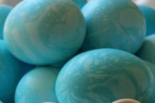 bold turquoise marble Easter eggs to rock
