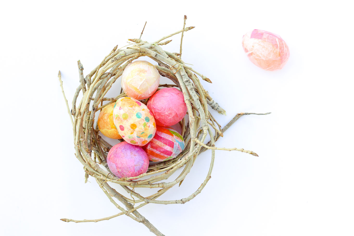 DIY colorful decoupage Easter eggs (via makeanddocrew.com)
