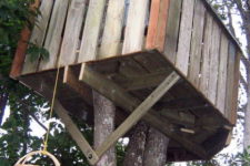 simple DIY tree house of reclaimed wood