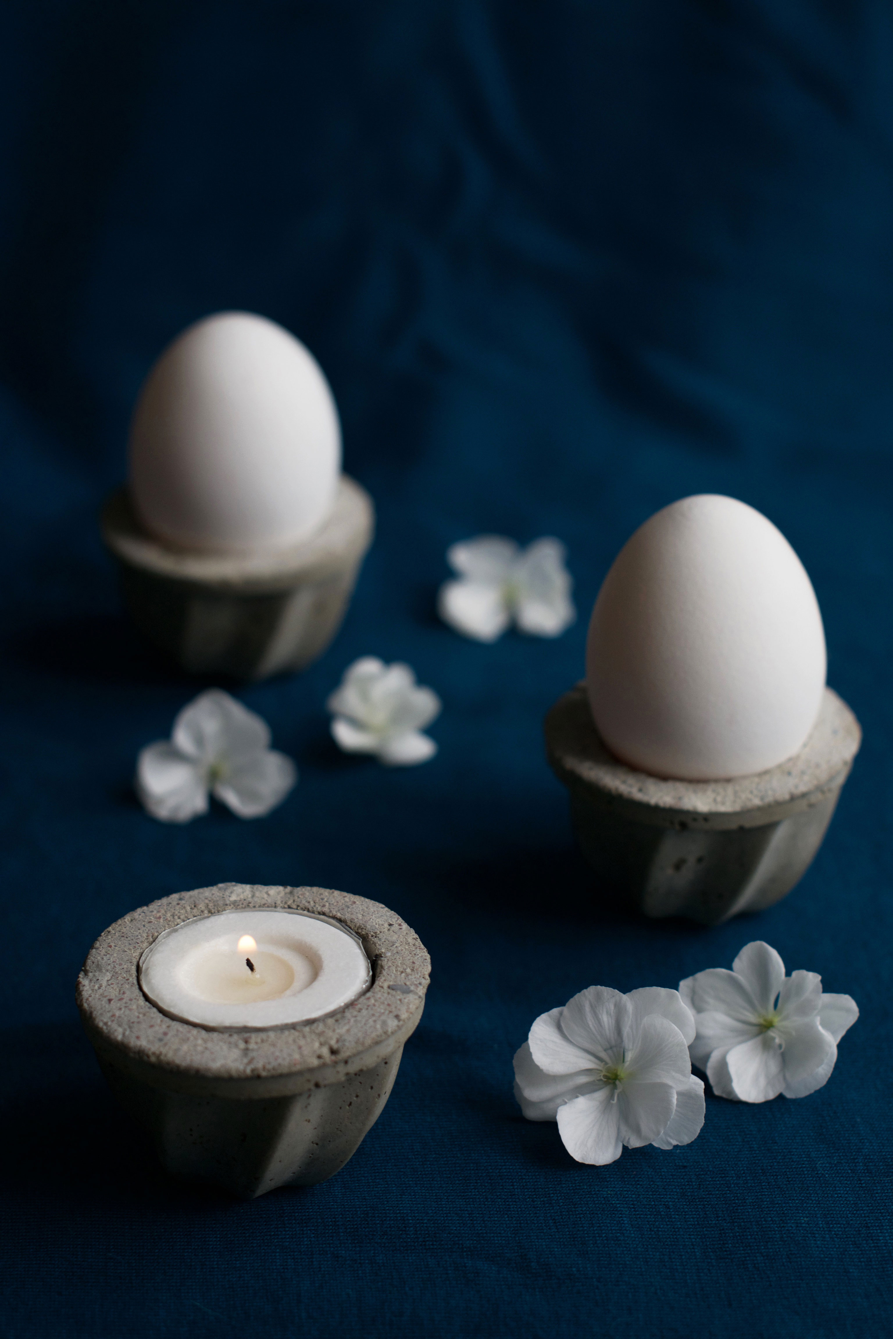 DIY concrete votives and egg cups in one