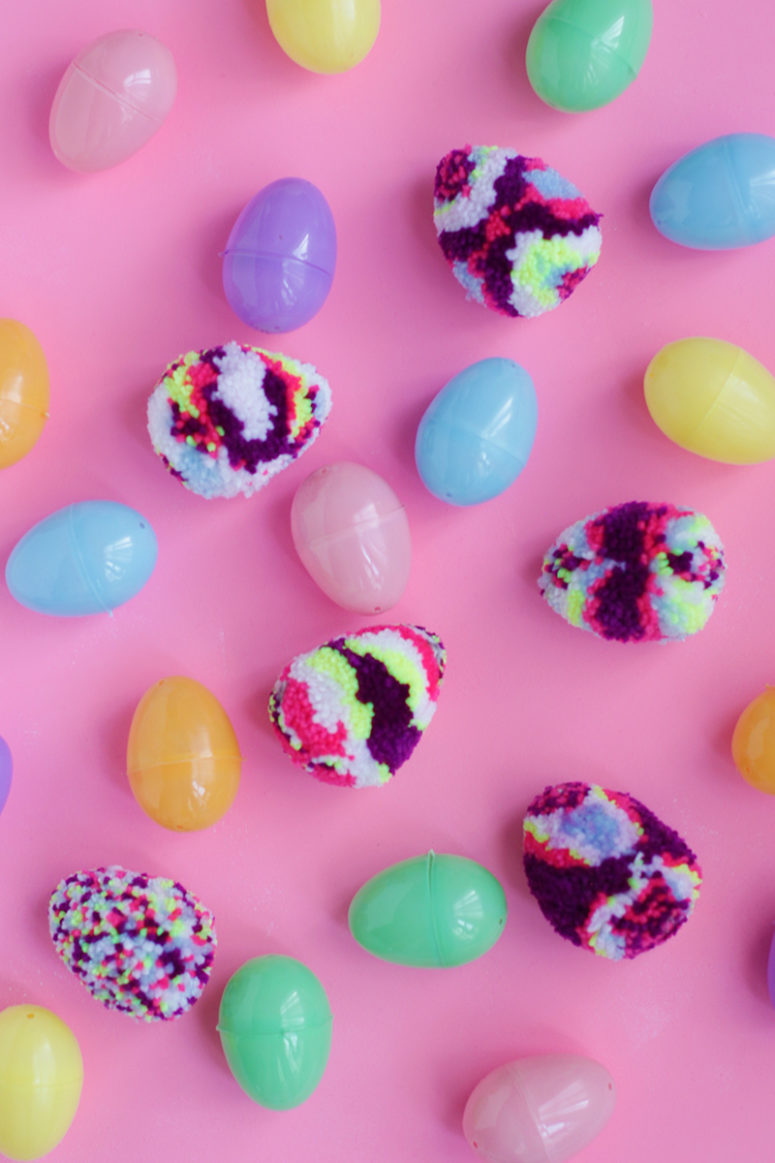 DIY multicolored pompom Easter eggs (via whydontyoumakeme.com)