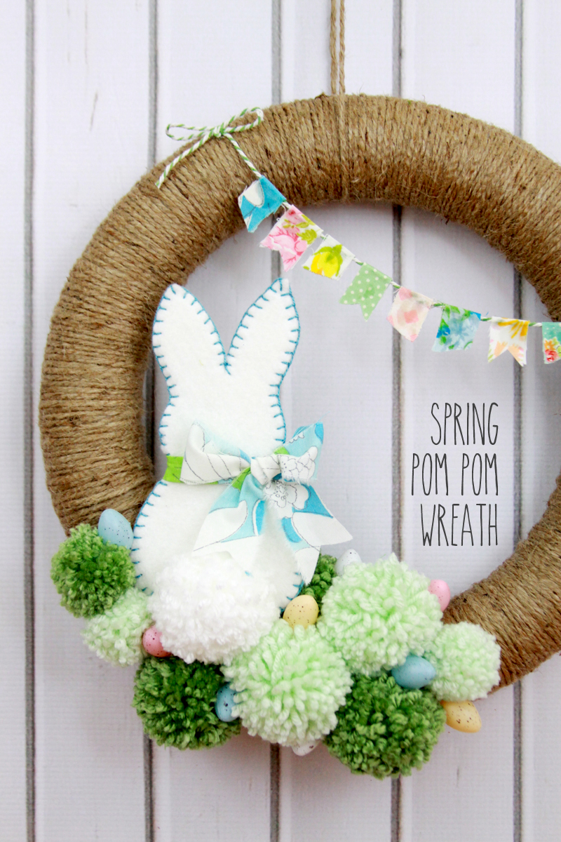 DIY bunny and eggs pompom Easter wreath (via https:)