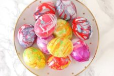 vibrant marbelized Easter eggs in red, pink, yellow