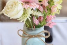 02 mint painted mason jars with twine and simple flowers