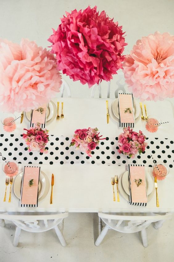 a polka dot table runner and touches of gold, pink and fuchsia for a cute feminine table