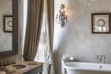 05 off-white and grey tones for a peaceful bathroom, and a wooden ceiling and draperies add a textural look