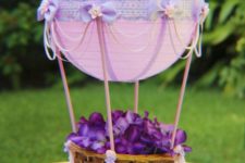 07 purple lanterns turned into hot air balloons with flowers in baskets