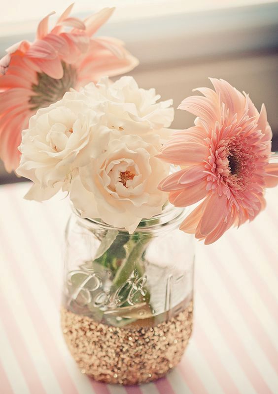 apply gold glitter to a mason jar and put flowers in there