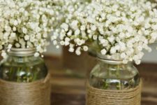 08 mason jars wrapped with twine and with baby’s breath is a cute rustic idea
