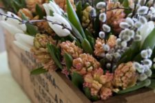 10 a wooden crate with fresh spring blooms and willows