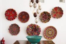 13 an African-inspired dining space with bold wall baskets and matching upholstery
