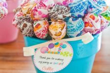 13 lollipop bouquets in pots are awesome for centerpieces
