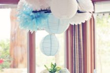 15 white and blue paper lanterns and pompoms as a hanging decoration