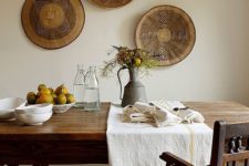 16 a rustic African feel is give to this warm dining space with baskets