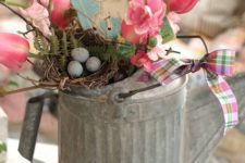 16 a shabby watering can with pink tulips, a faux nest and a vintage card