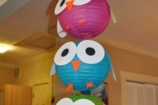 16 bold paper lanterns turned into owls will do for any baby shower