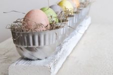 17 metal cups with straws and pastel eggs