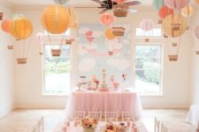 18 hot air balloon hanging over the space made with paper lanterns