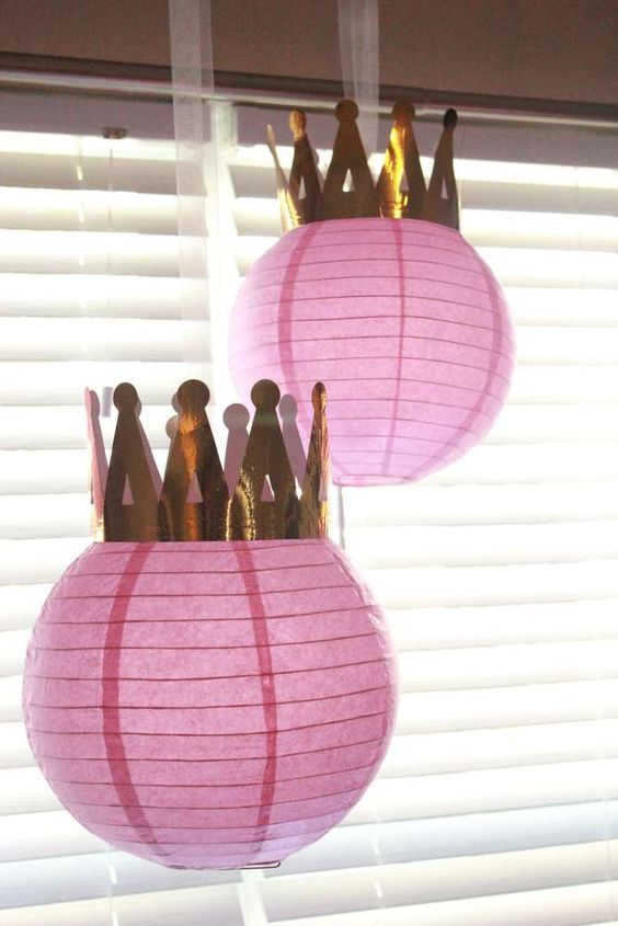 pink crown topped paper lanterns for a little princess baby shower