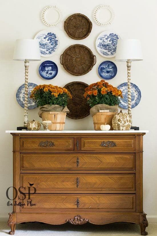 wall baskets are combined with blue and white plates for a rustic feel