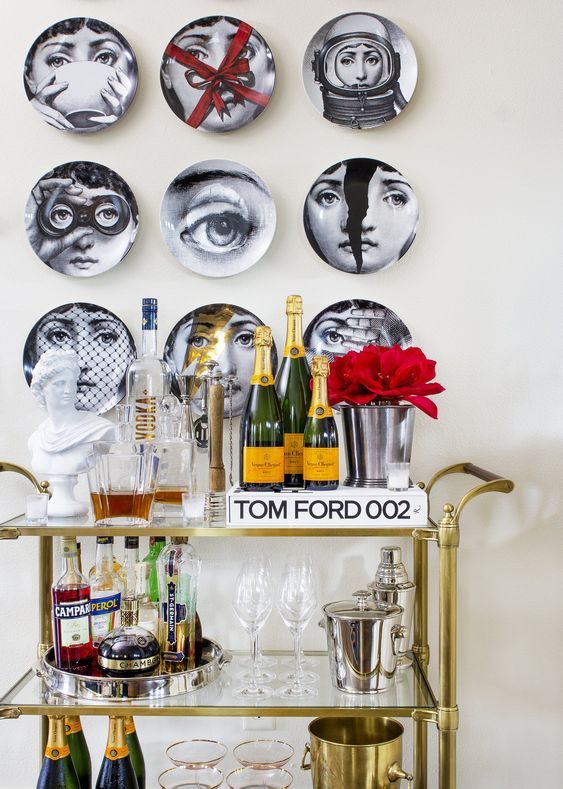 a plate wall is a bold and quirky decoration for any modern space, if the plates are like these ones