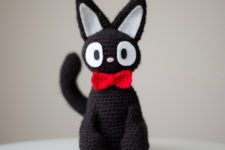 DIY amirugumi black cat with a red bow tie