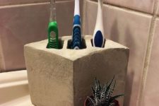 DIY concrete toothbrush holders