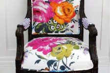 02 a gorgeous vintage armchair with black framing and white upholstery plus super bold flowers
