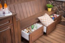02 a stained wooden bench with storage drawers