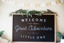 03 a chalkboard sign decorated with fresh greenery