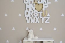 04 cardboard letters with a heart will help to study the alphabet
