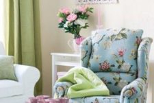 05 blue armchair with a footrest and pink and white flower prints