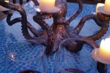 06 a metal octopus candle holder looks mysterious and catches an eye