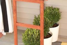 06 folding wooden console with space under it to place planters
