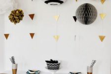 gold triangle vertical garlands make the black and white palette shine