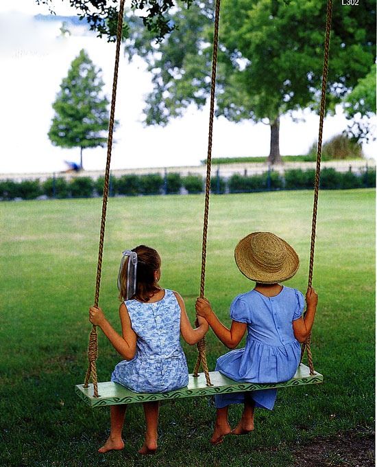 double wooden and rope swing is ideal for several children