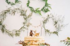09 greenery wreaths as a dessert table backdrop and some greenery for the cake display