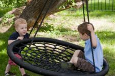 12 a spiderweb swing for several kids to play