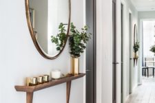 12 oversized mirror in a wooden frame and a matching shelf